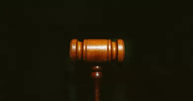 Gavel against black background