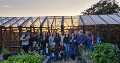 A group of students and faculty gathered at UL's rooftop garden