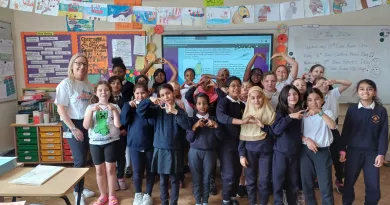 pHOTO OF pRIMARY SCHOOL PUPILS WITH CERTIFICATES 