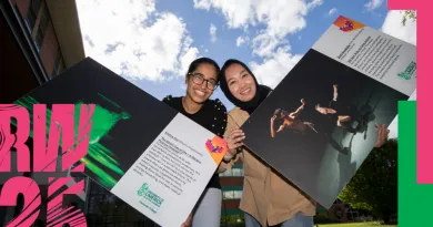 Research Week poster showing two entrants holding up their pictures