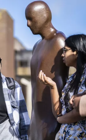 Students standing beside Brown Thomas