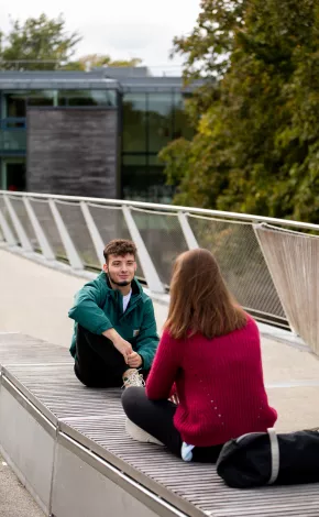 Students sitting on bench