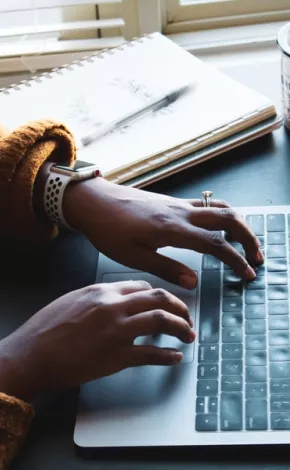 image of someone using a laptop whilst working from home