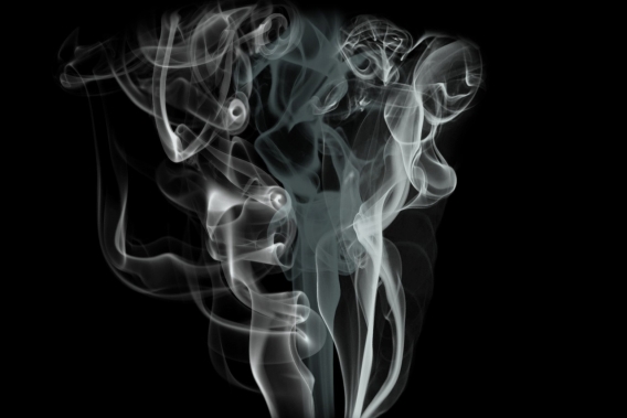 Image shows smoke on a black background.