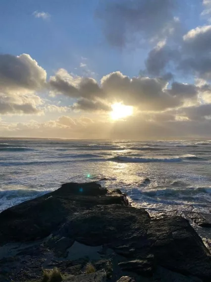 Image shows sunshine on an ocean