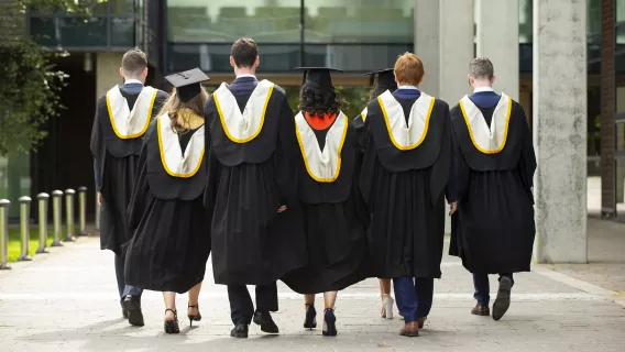 Graduation students in gowns 