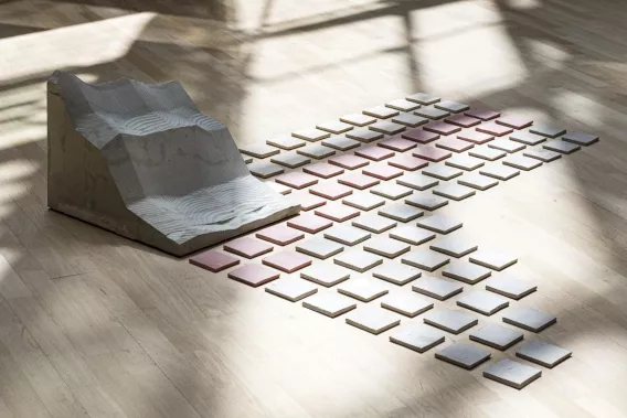 Niamh Schmidtke, Foundations, 2020 Digitally carved sandstone block, 93 fired ceramic tiles stained with natural oxides