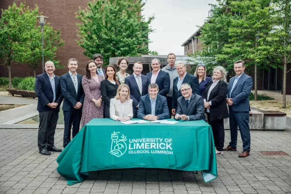 The full group pictured at the signing in UL