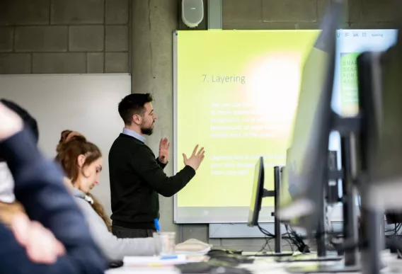 Image of a staff member presenting to students