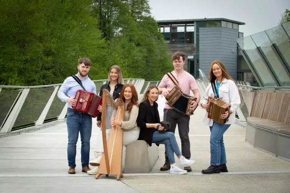 The UL students pictured with their instruments on the Living Bridge