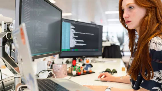 person sitting at computer