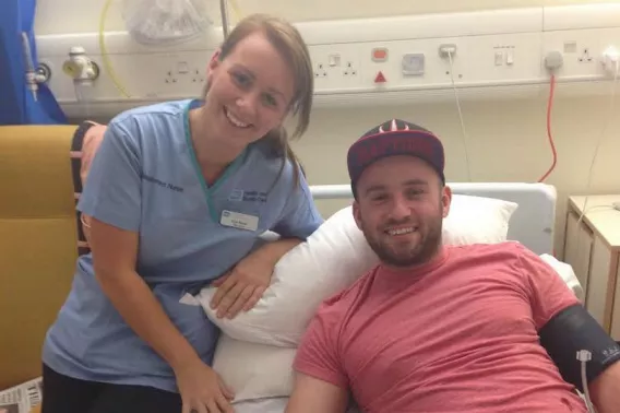 Johnny Paradise in his hospital bed after his operation