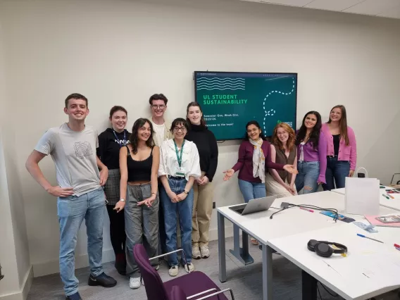 A group of students standing together smiling