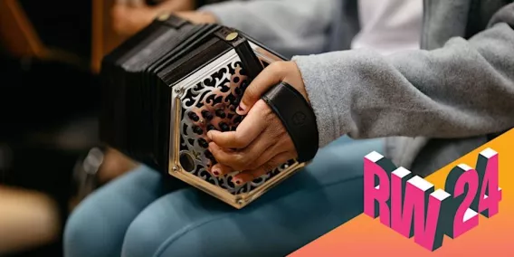 student playing the concertina, with the Research week logo in the corner