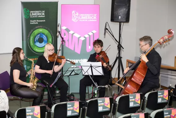 Four musicians playing together