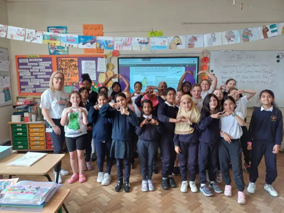 pHOTO OF pRIMARY SCHOOL PUPILS WITH CERTIFICATES 