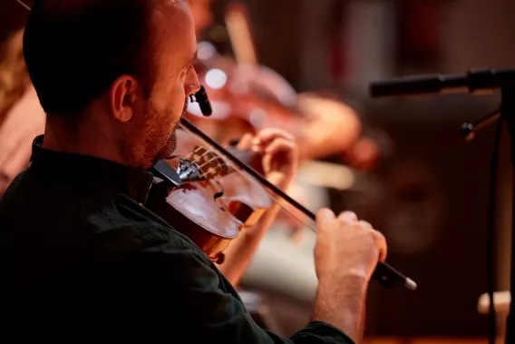 Man playing the fiddle