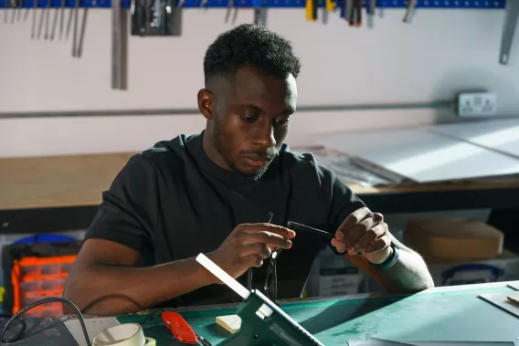 man working with cables