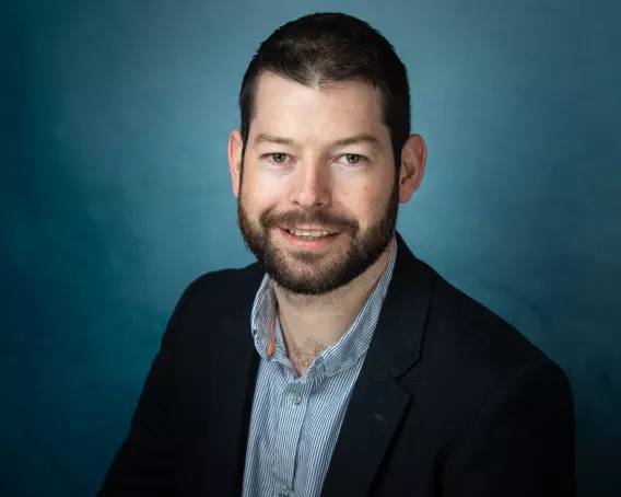 man in blazer and shirt