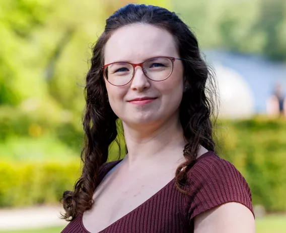 Woman smiling with long brown hair