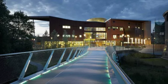 Irish World Academy building lit up at night