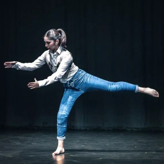 girl in jeans dancing