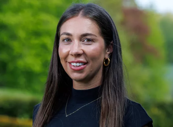 Woman with long brown hair. 