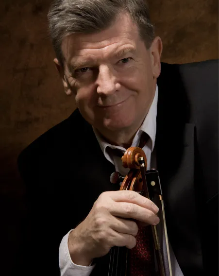 Music in suit holding fiddle