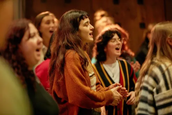 Group of singers in bright colourful clothing