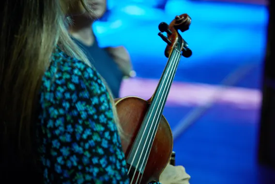 Musician holding violin