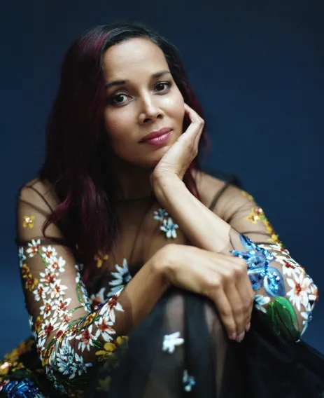 Rhiannon Giddens sitting on chair