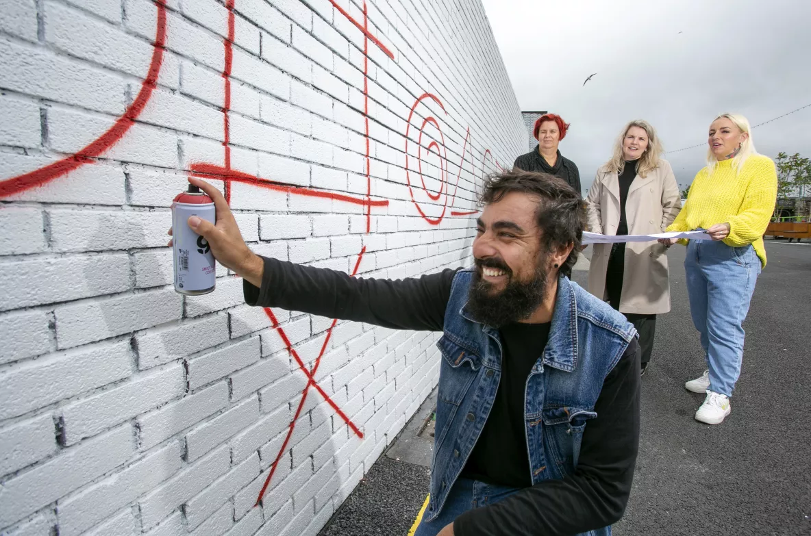 Artist Digo Diego poses at the UL City Centre campus