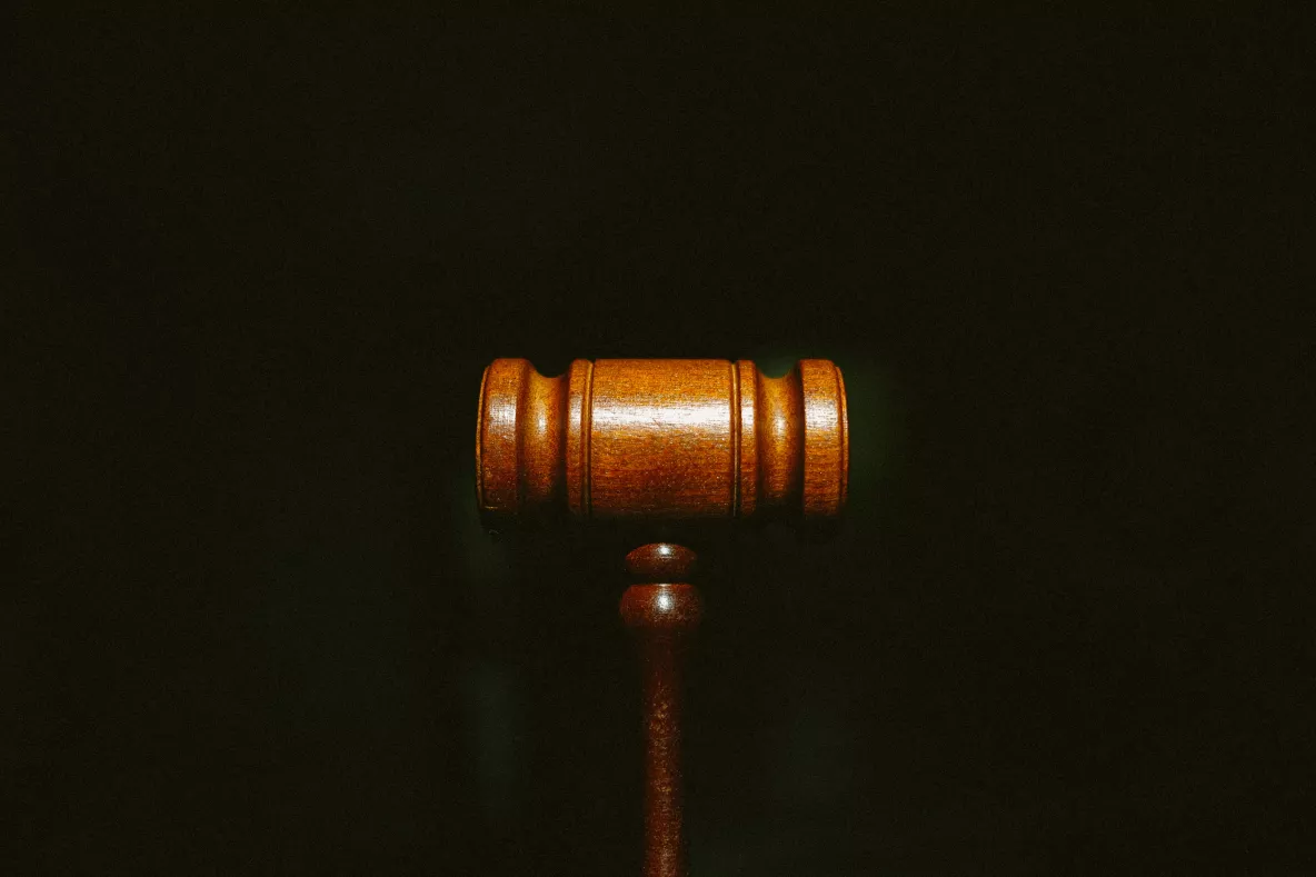 Gavel against black background