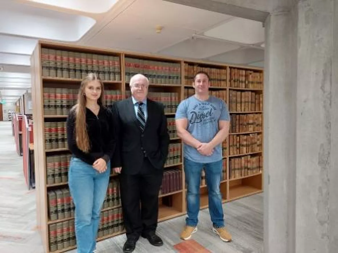 Arina Gabija Downes and Martin Ryan pictured with Professor Ray Friel