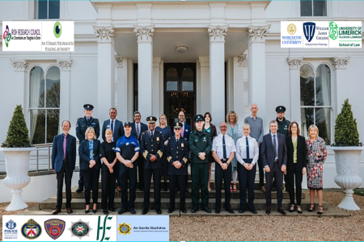 Large group of people who attended the event, many in uniform, pictured outside Plassey House on the U.L campus