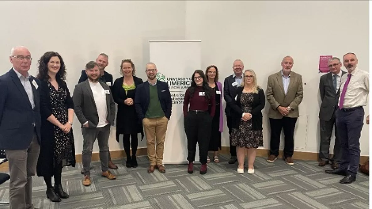 Group of attendees and speakers pictured at the event 