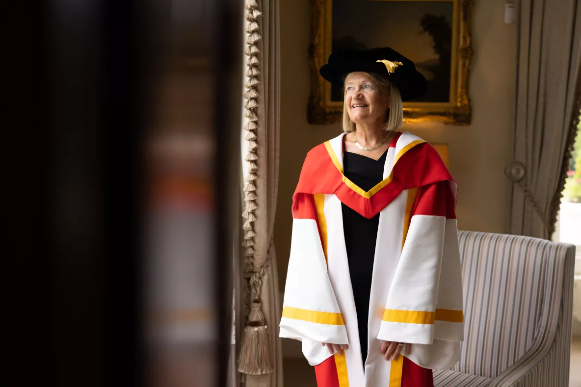 A picture of UL alumnus Brigid Laffan in her ceremonial robes