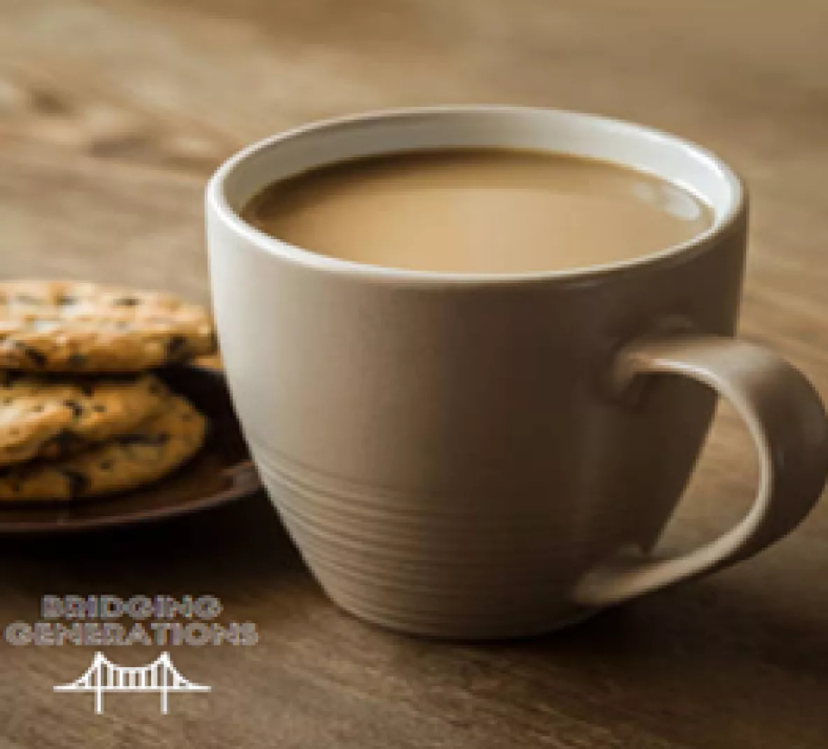 Bridging Generations logo- Cup of tea and plate of cookies