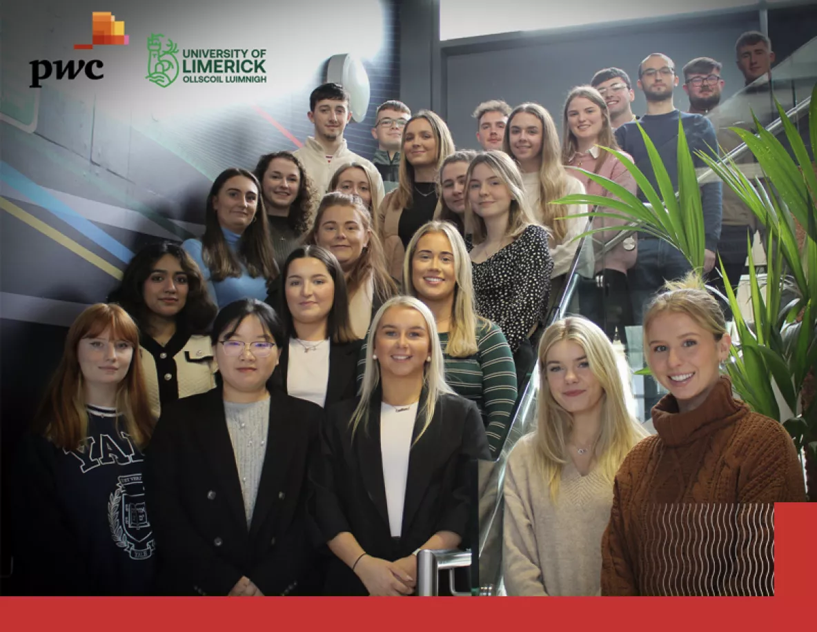 PwC award recipients pictured in a large group on a stairwell