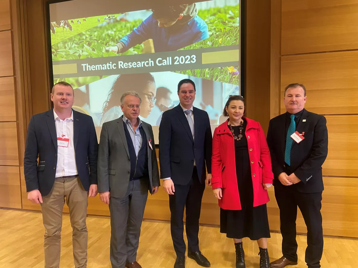 A group picture of five people at the funding announcement