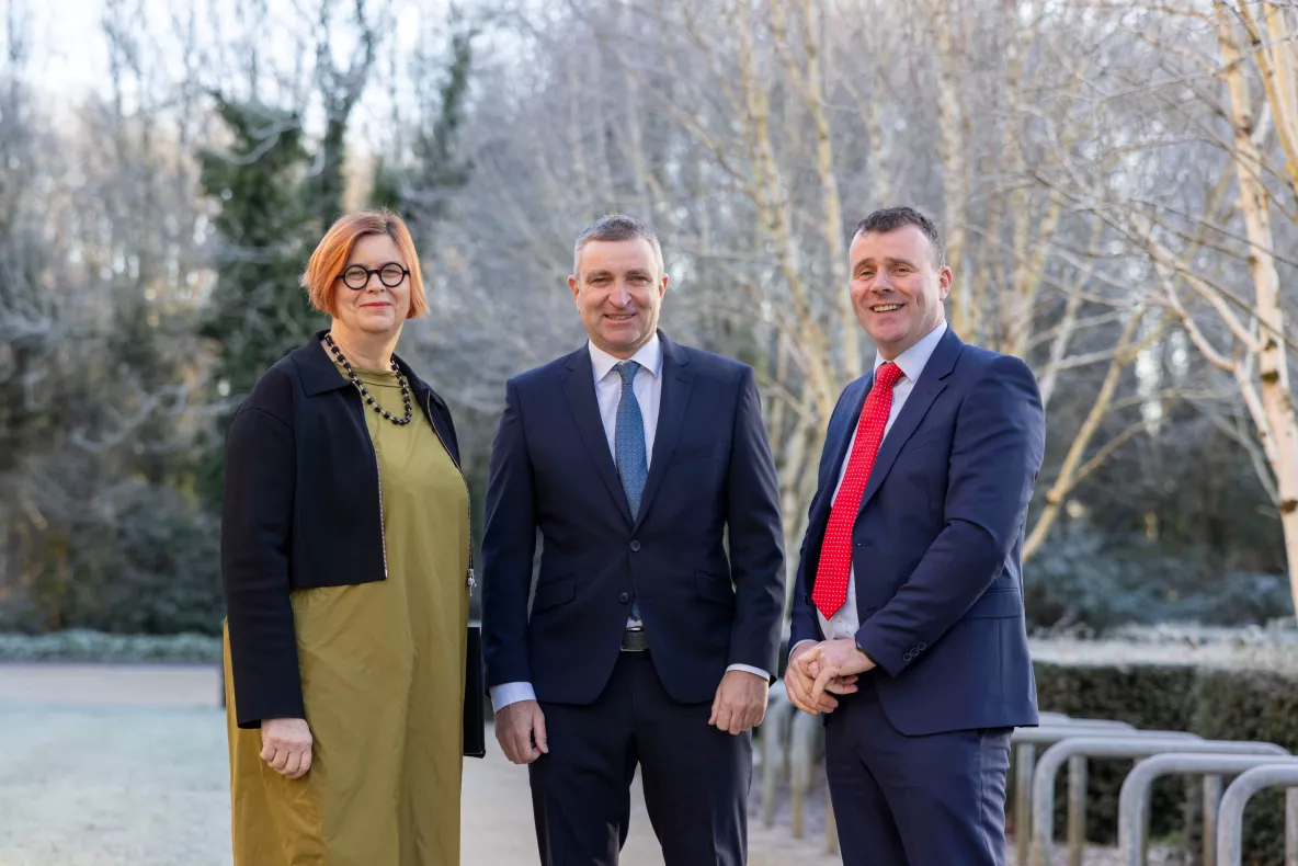 A picture of UL President Professor Kerstin Mey with Minister Niall Collins and HR Director Bobby O'Connor on the UL campus