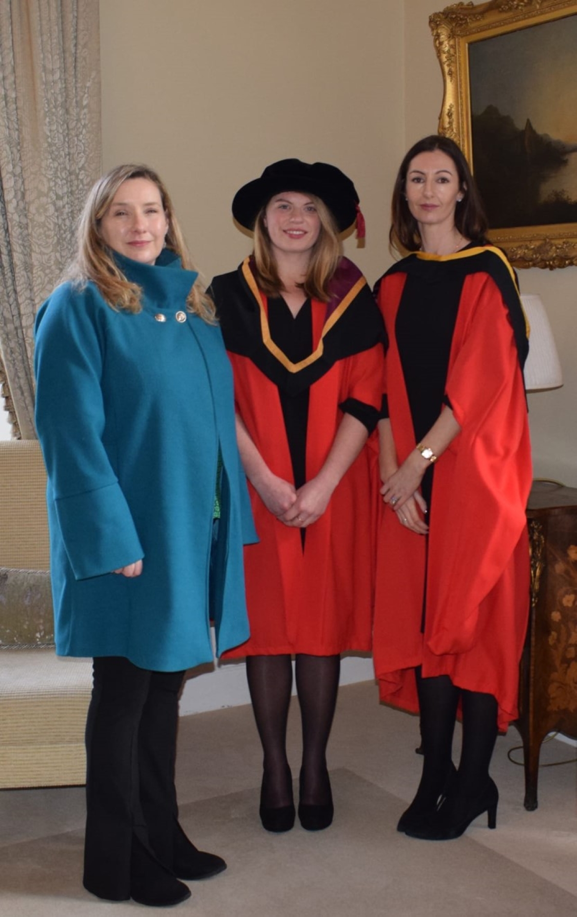 Doctor Una Woods of the school of law, newly graduated Doctor Mary Curtin, and Doctor Christine Cross of the kemmy business school 