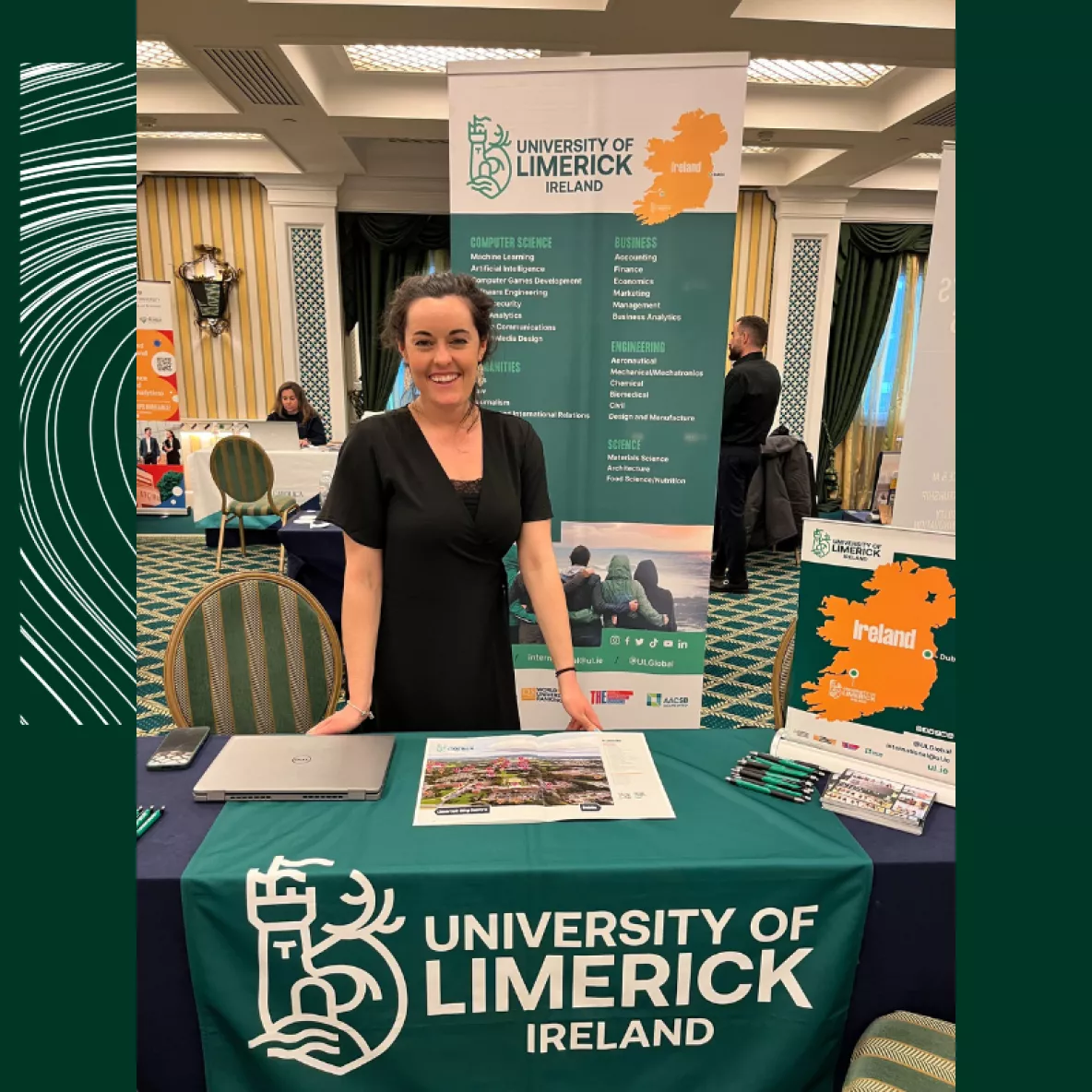 Photo of Ciara at a fair behind a University of Limerick stand