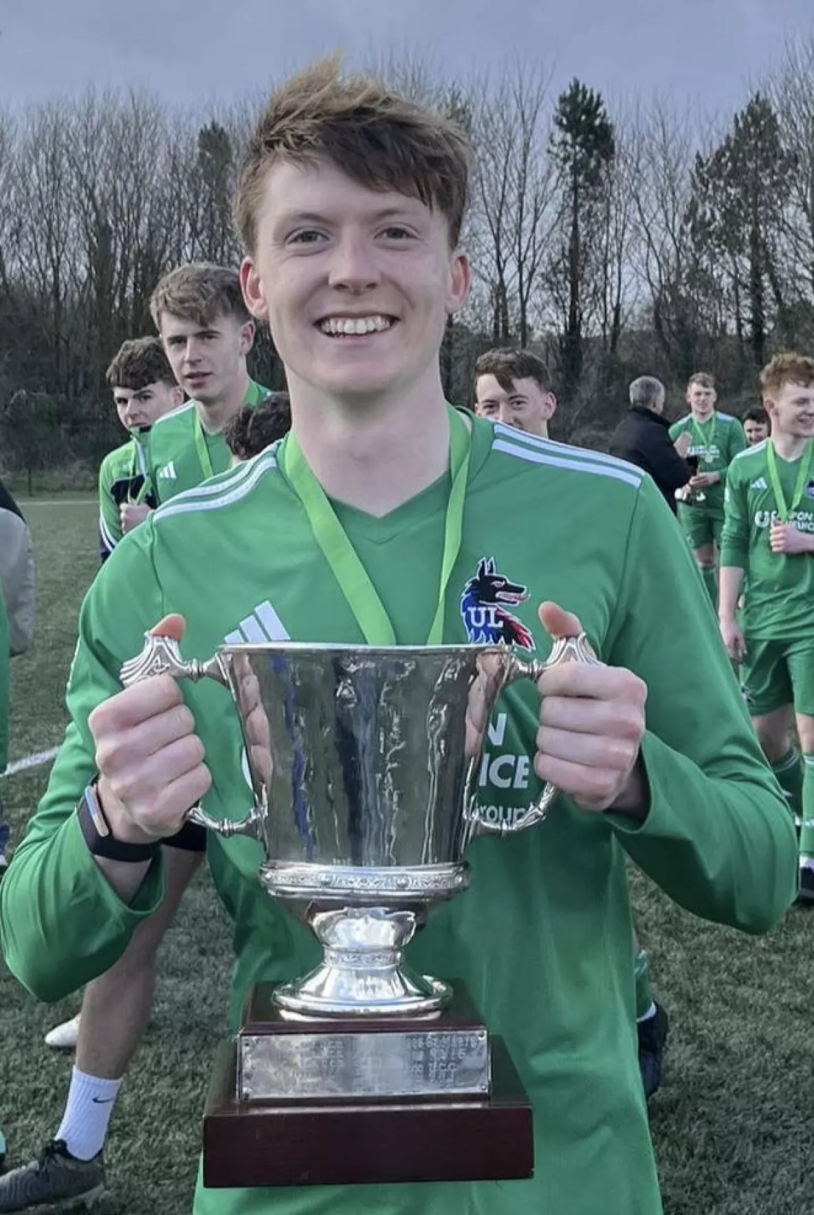 eoin redmond holding the collingwood cup