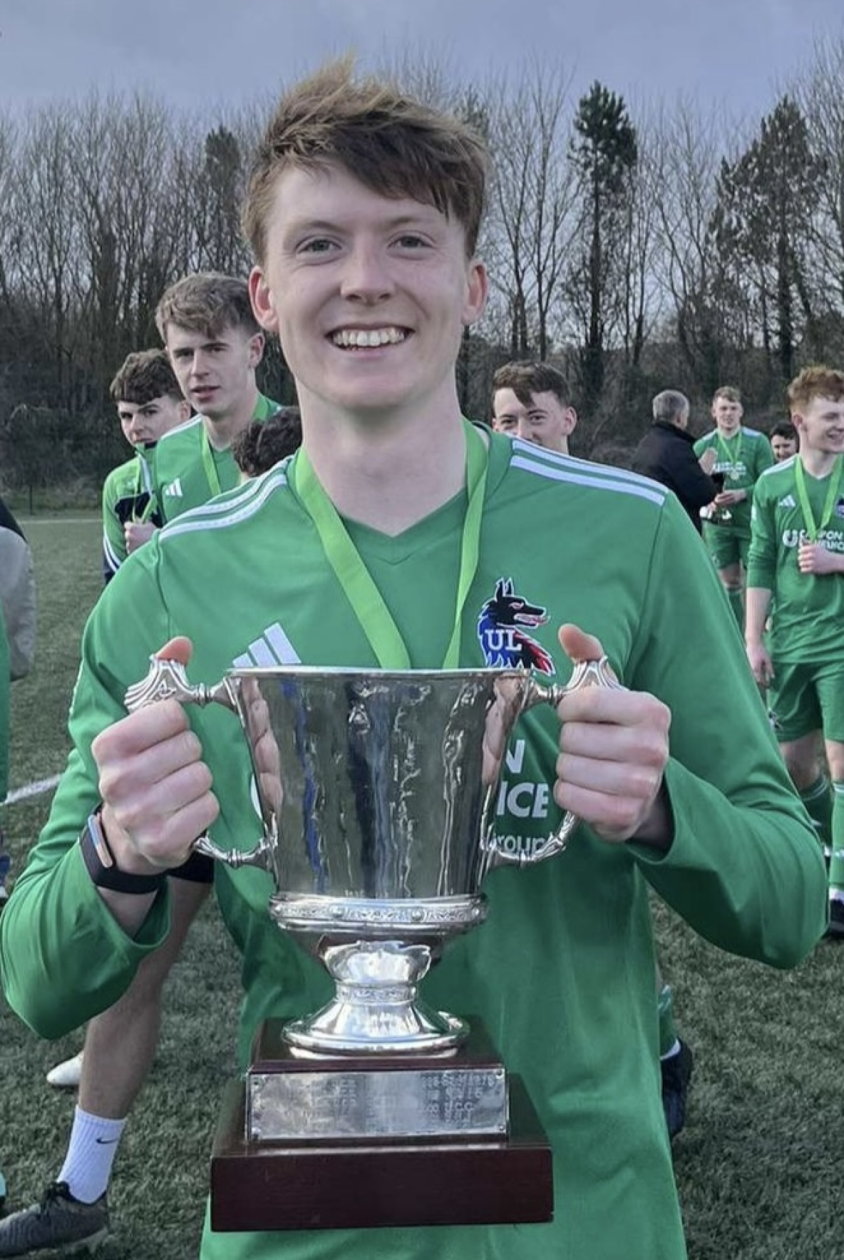 eoin redmond holding the collingwood cup