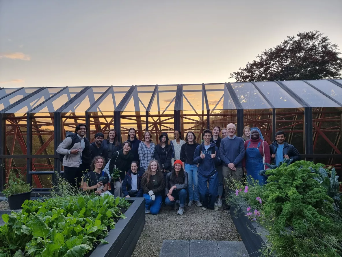 A group of students and faculty gathered at UL's rooftop garden