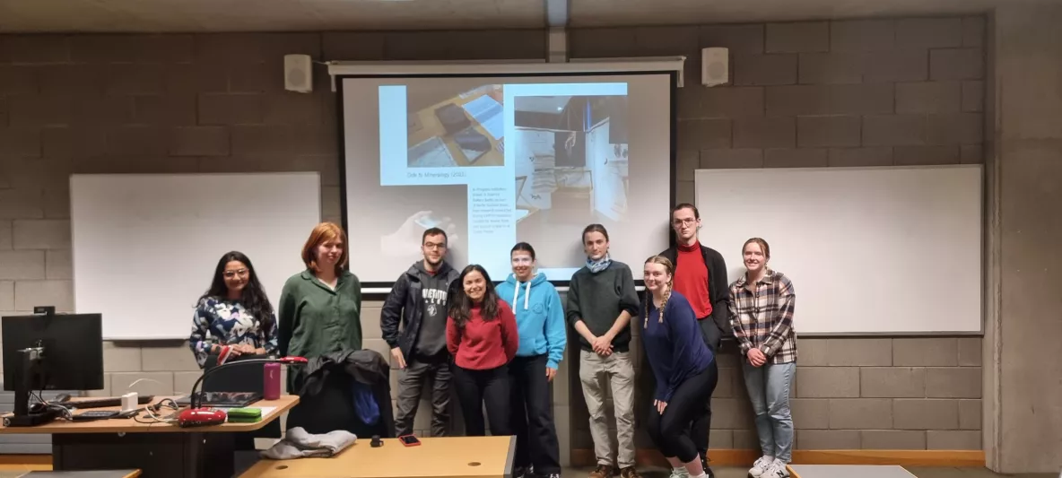 A group of students with a guest speaker