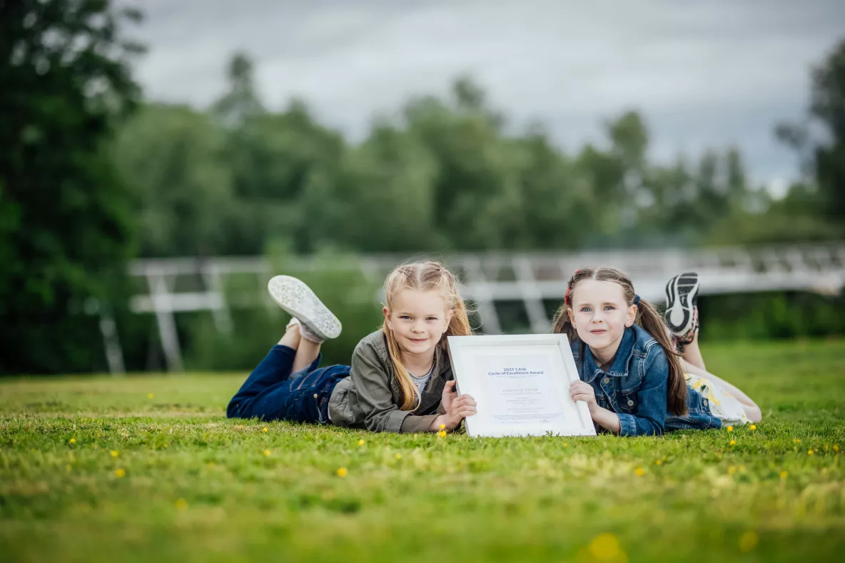 REPRO FREE Fiadh Hussey and Cara Dunne, performers from the Limerick-based Gemstars School of Performing Arts, who featured in the video, pictured celebrating with the CASE Circle of Excellence award