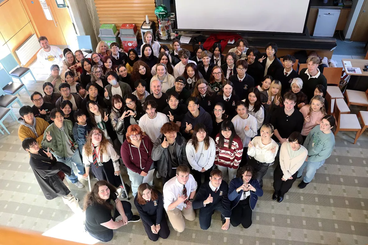 Big group of 4 year japanese students in the globe