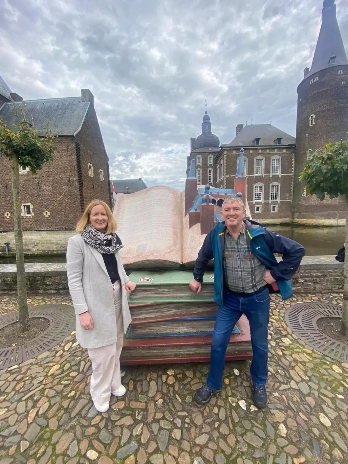 Helen Fitzgerald and Dr Johnny Connolly in a town square in Herleen, the Netherlands